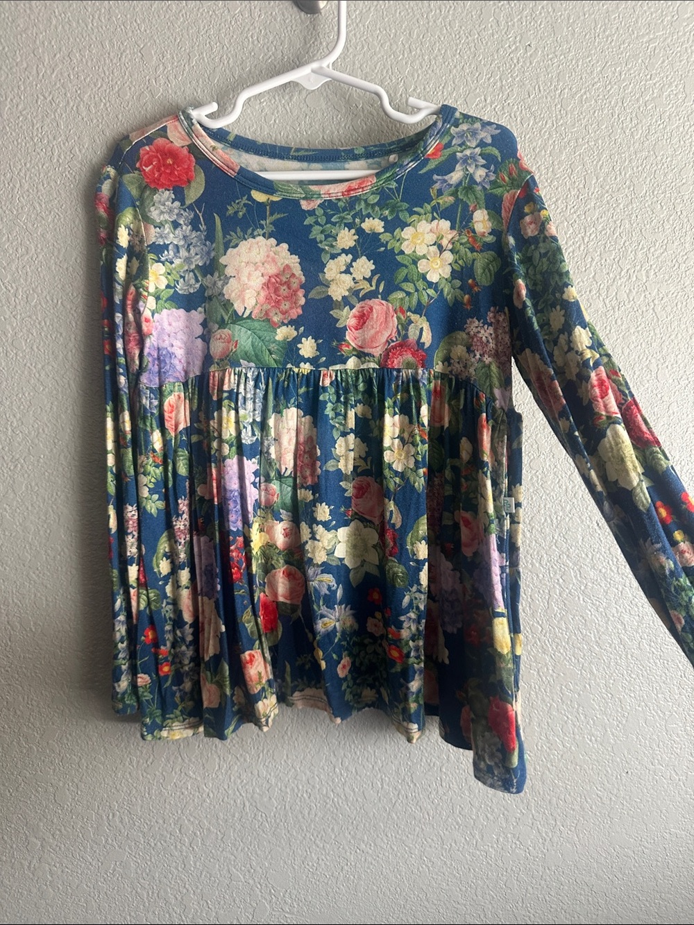 Posh Peanut Navy Floral Peplum Long Sleeve Top